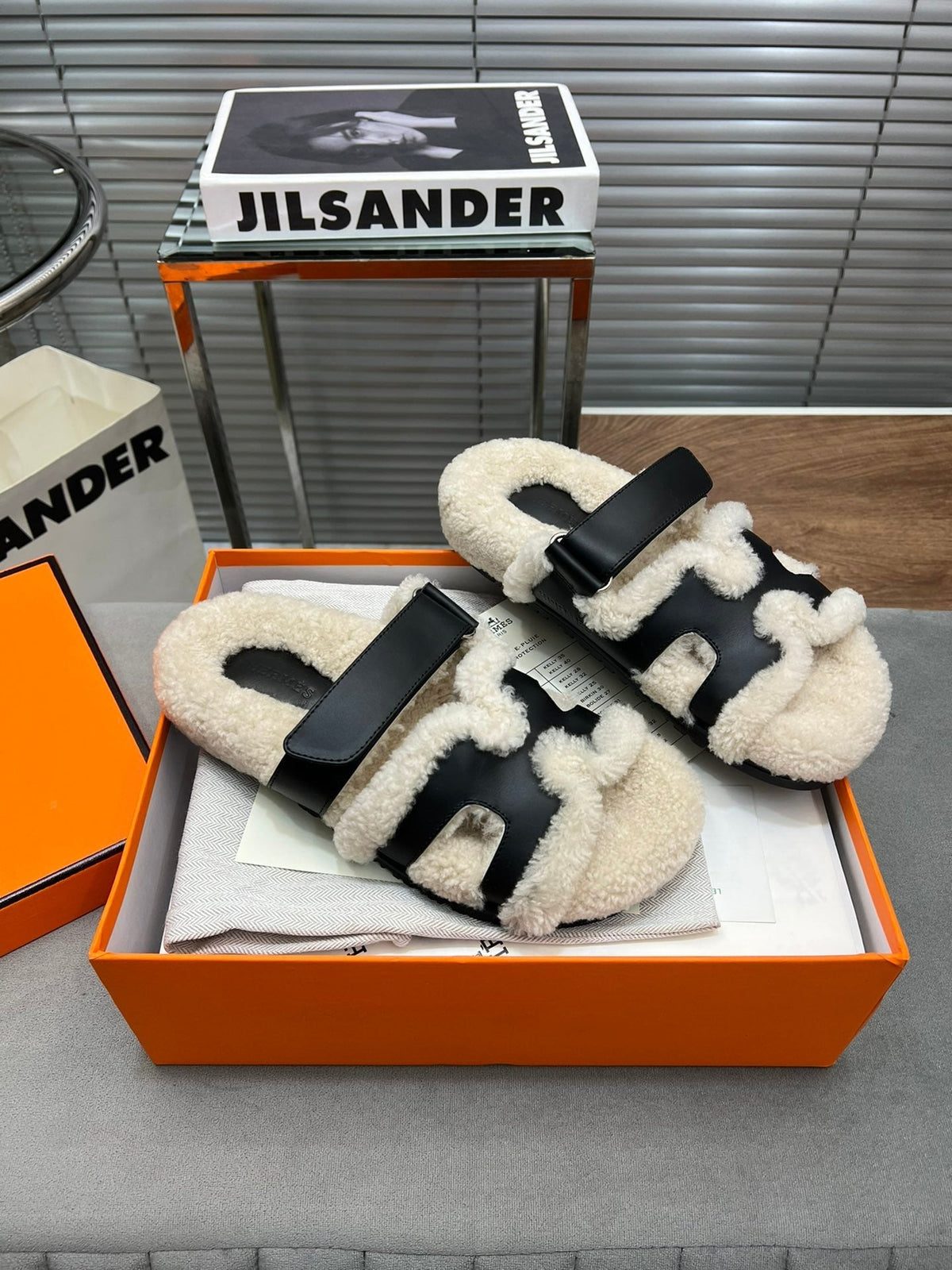 Hermes Chypre Slippers in Beige Lamb Wool and Black Calfskin