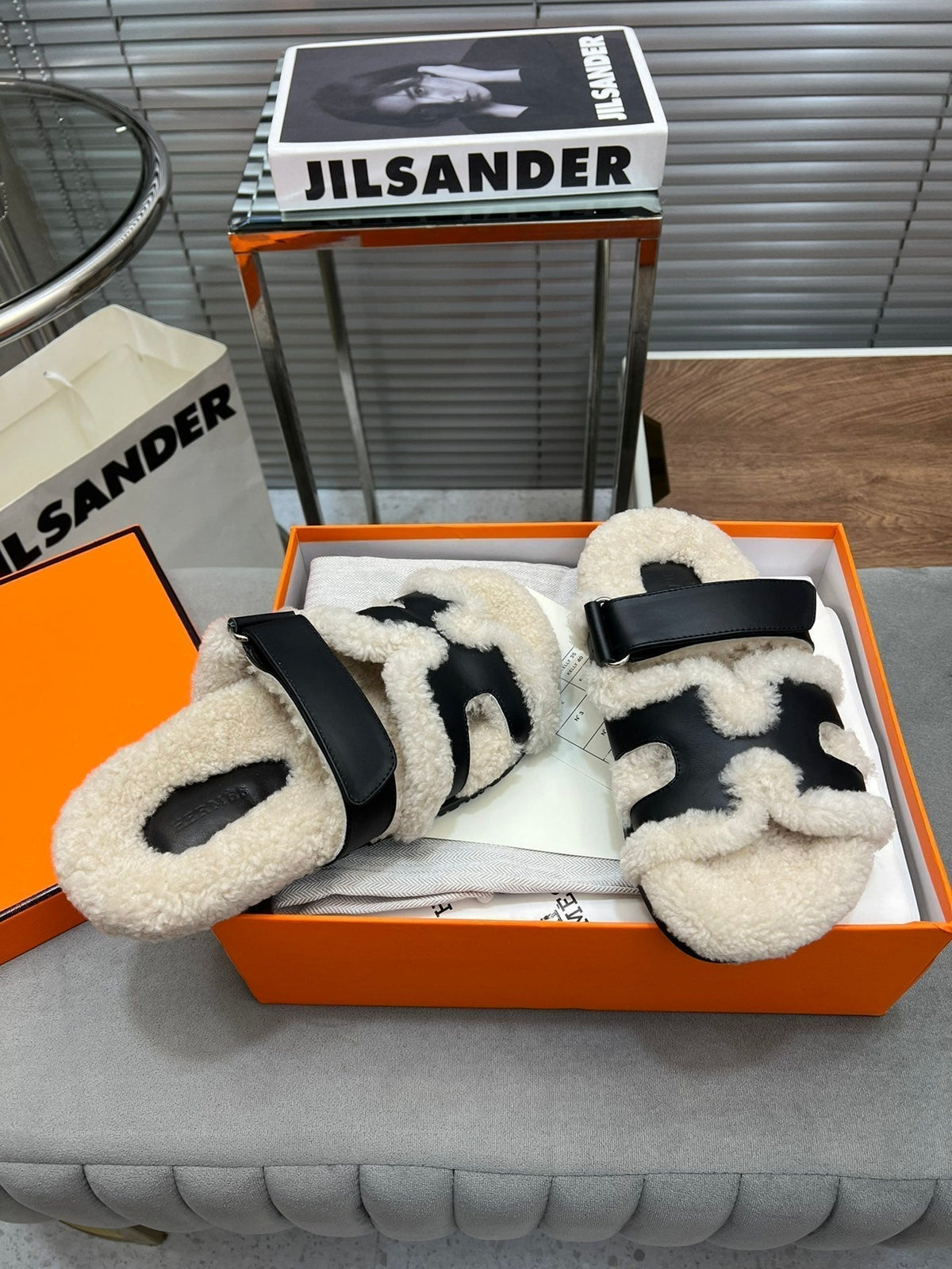 Hermes Chypre Slippers in Beige Lamb Wool and Black Calfskin