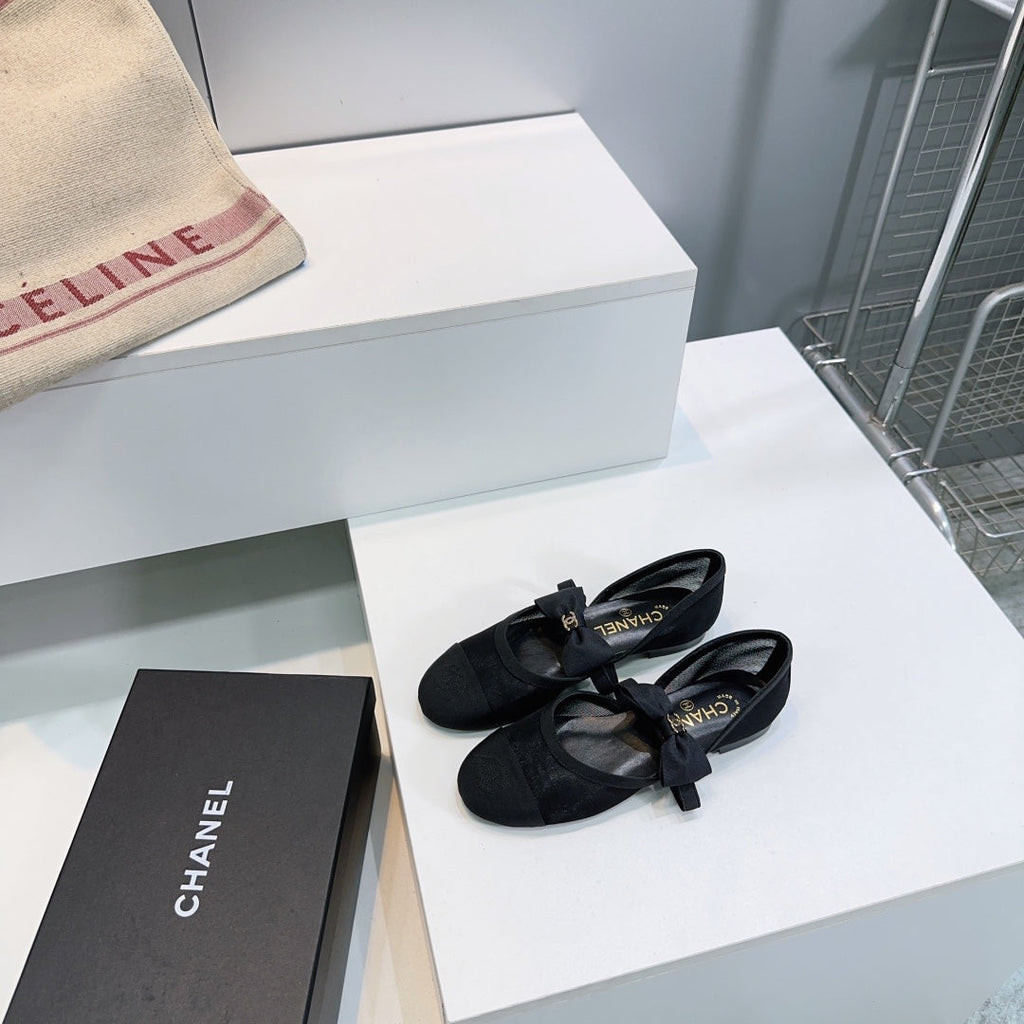 Chanel Flat Mary Jane Shoes 25S in Black Mesh Fabric Embossed Logo with Bow