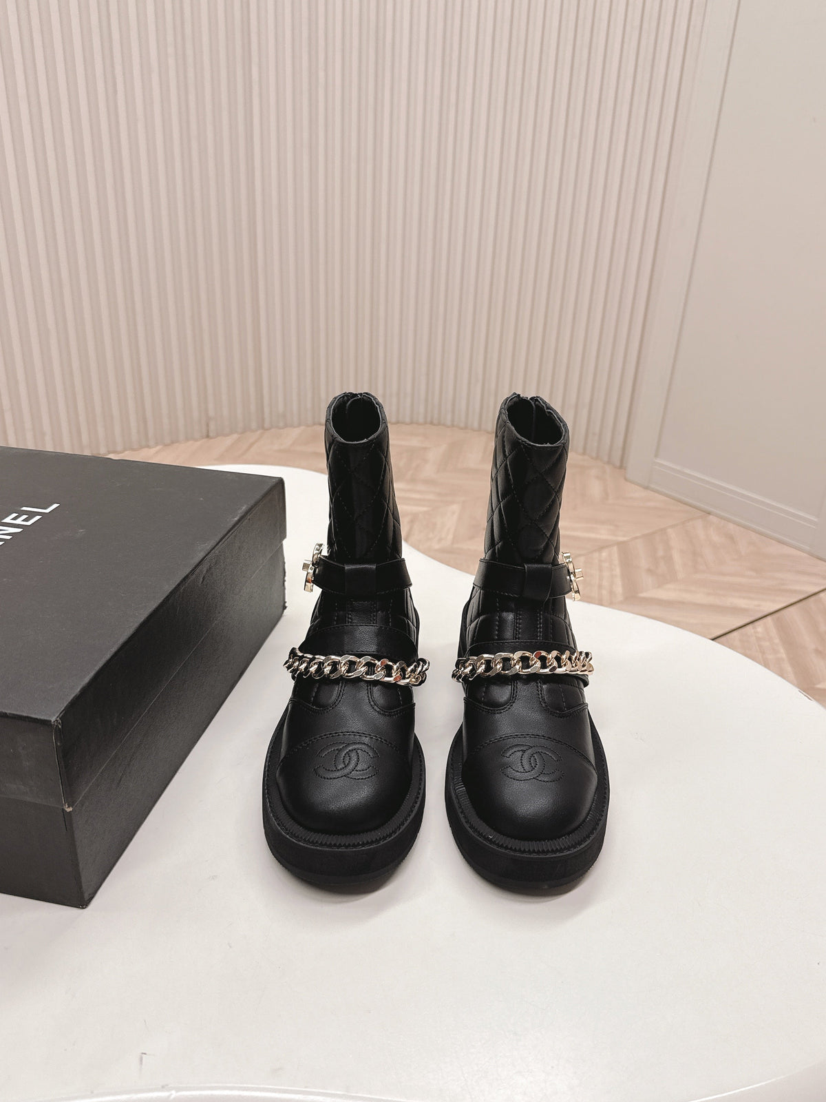 Chanel Ankle Boots 25S in Black Lambskin Embossed Logo with Gold Hardware