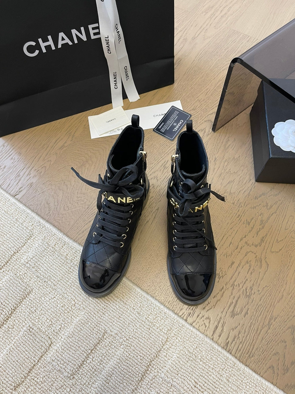 Chanel Alphabet Martin Boots in Black Lambskin