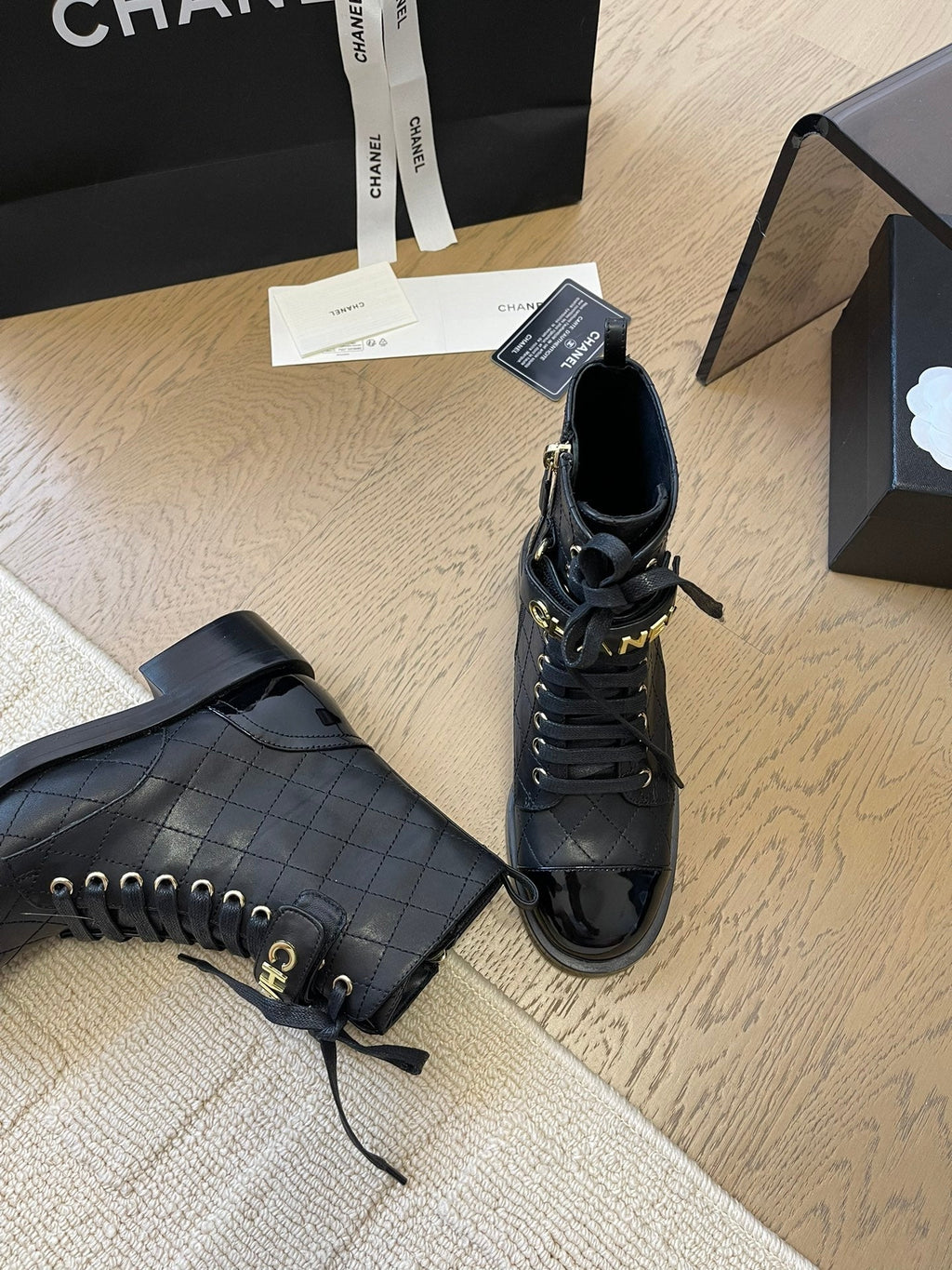 Chanel Alphabet Martin Boots in Black Lambskin