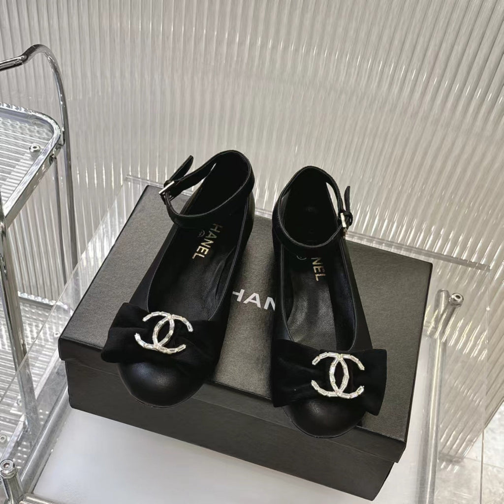 Chanel Bow Mary Jane Shoes in Black Lambskin