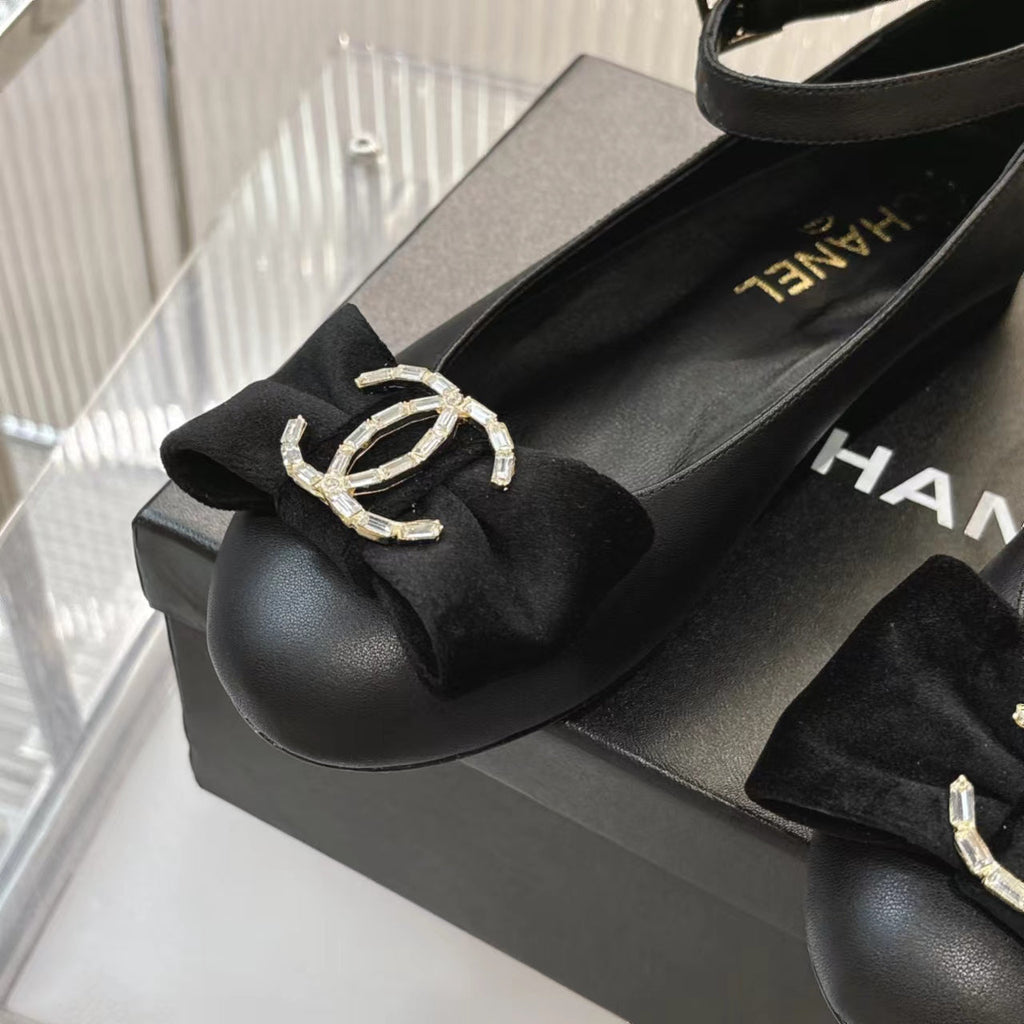Chanel Bow Mary Jane Shoes in Black Lambskin
