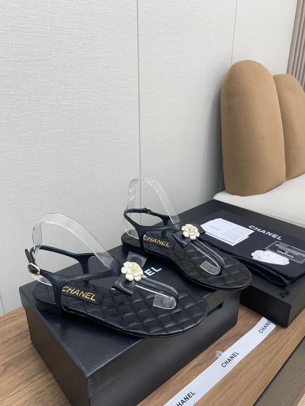 Chanel Thong Sandal in Black Lambskin with Pearl Flower