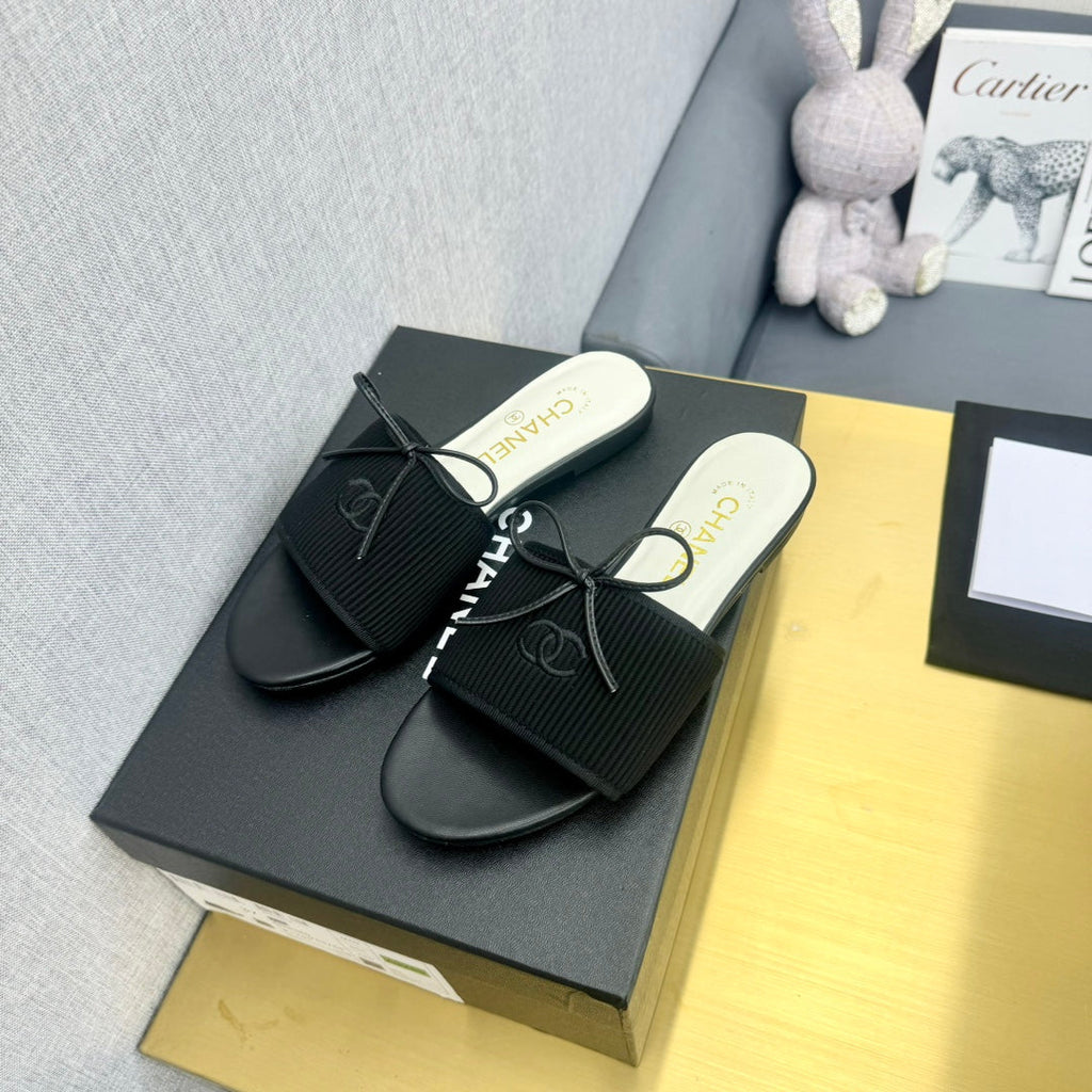Chanel Bow Slippers in Black Lambskin