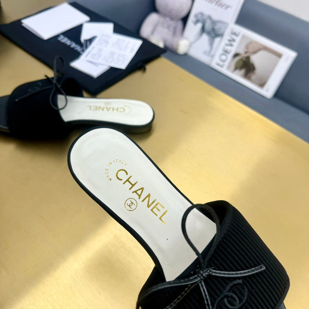 Chanel Bow Slippers in Black Lambskin