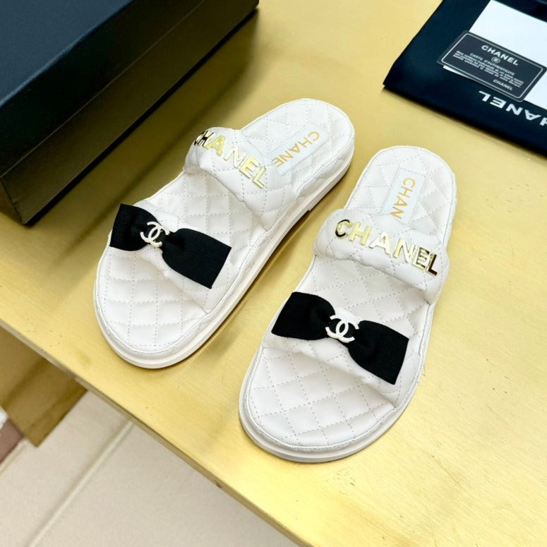 Chanel Dad Sandals with Bow in White Lambskin Mule