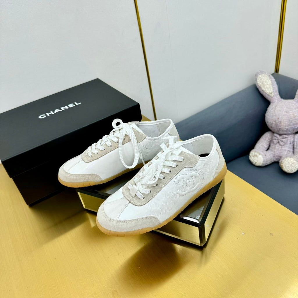 Chanel Sneaker in White Calfskin and Suede