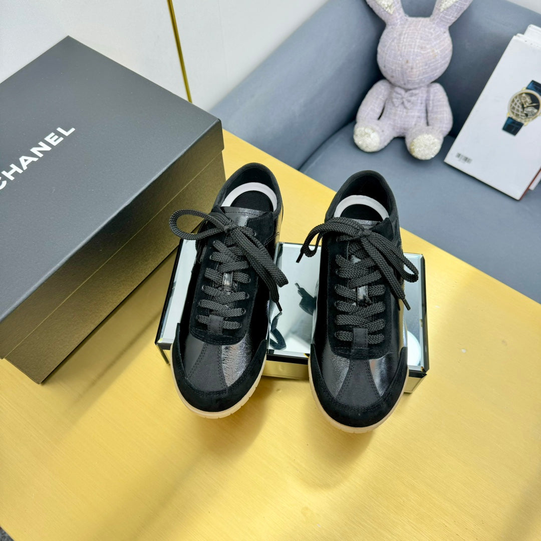 Chanel Sneaker in Black Calfskin and Suede