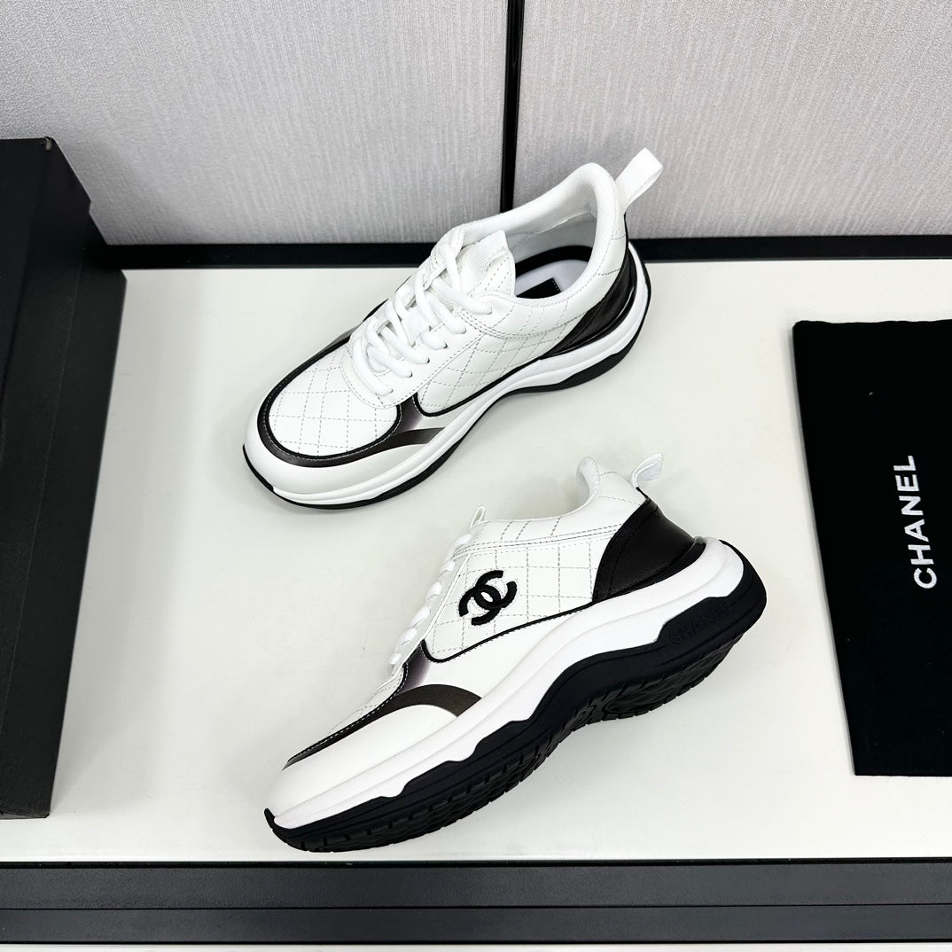 Chanel Sneaker in White Mix Black Embroidered Lambskin