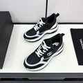 Chanel Sneaker in Black Mix White Embroidered Lambskin