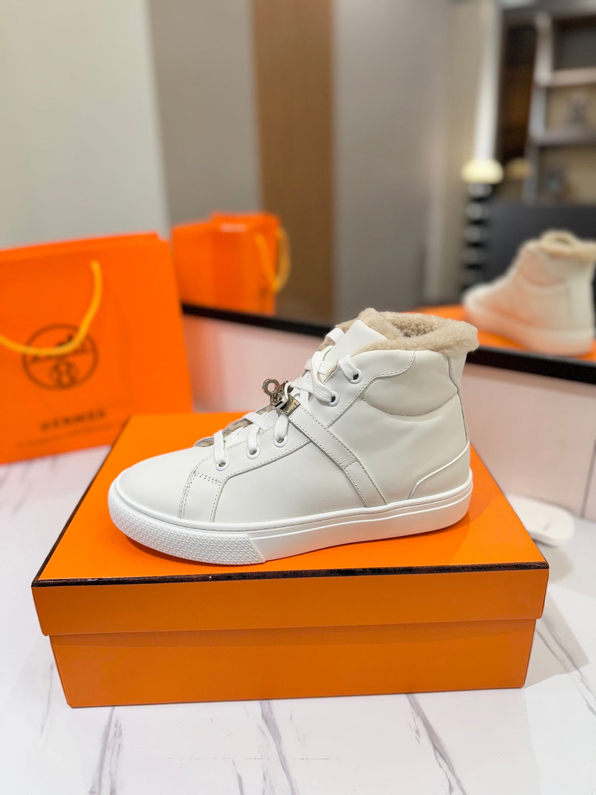 Hermes Chealsea Boots in White Calfskin and Fleece Lining