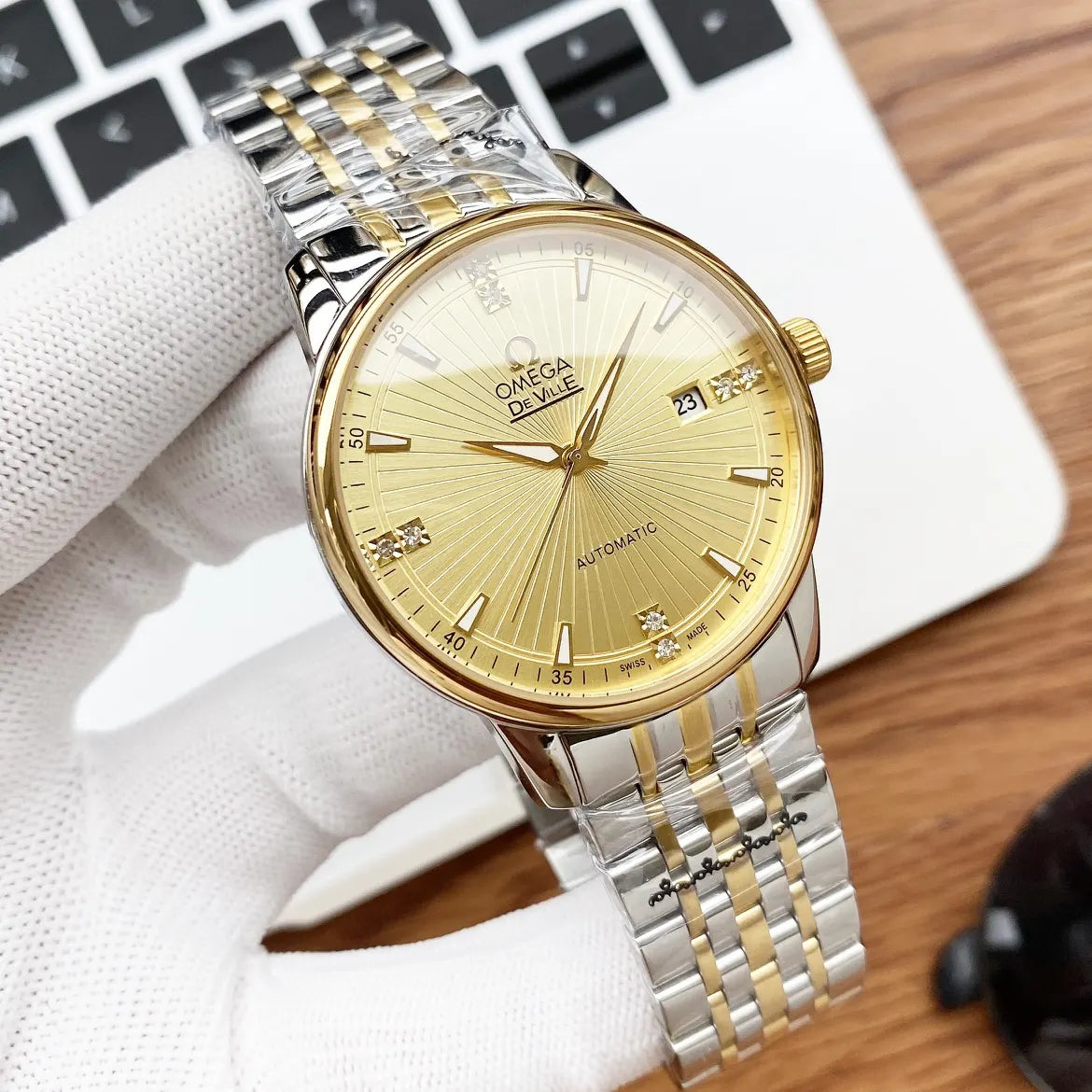 steel Omega De Ville Gold Dial